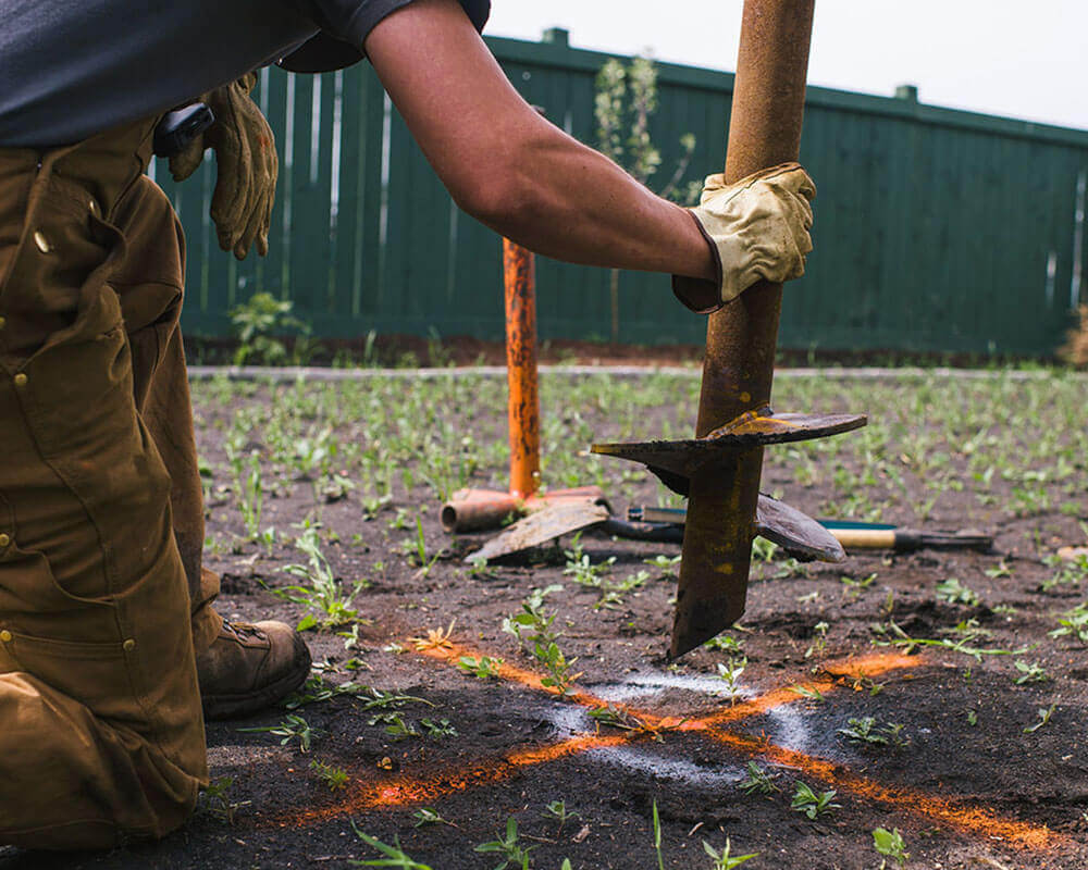 Screw pile locations are marked out